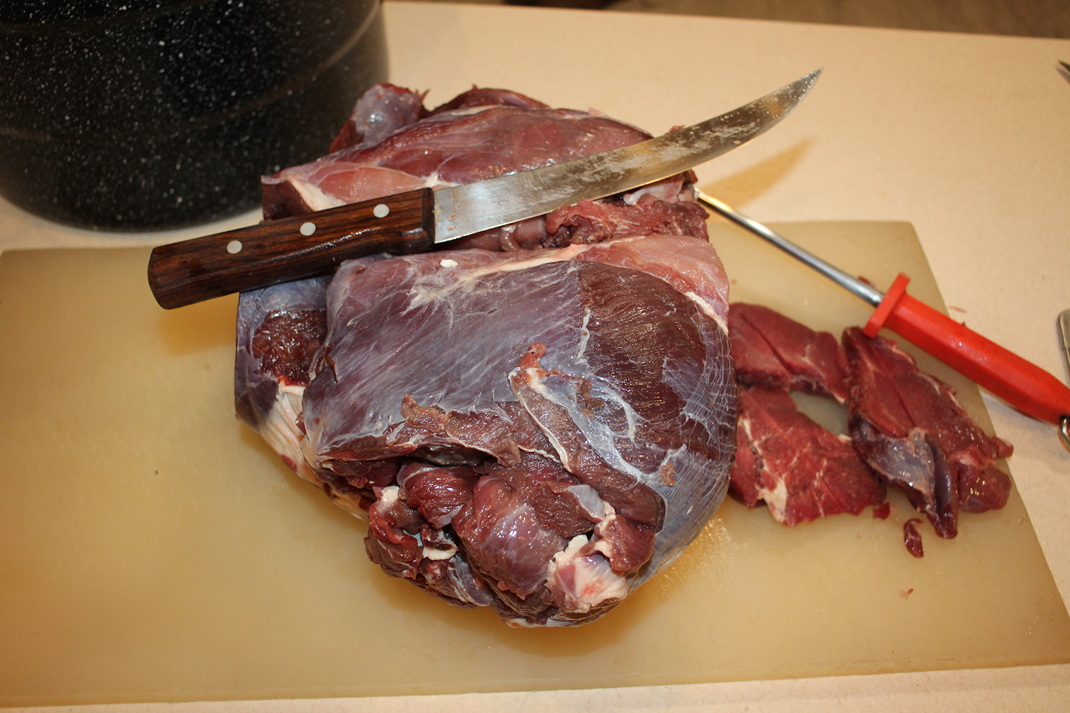 Slicing Deer Meat